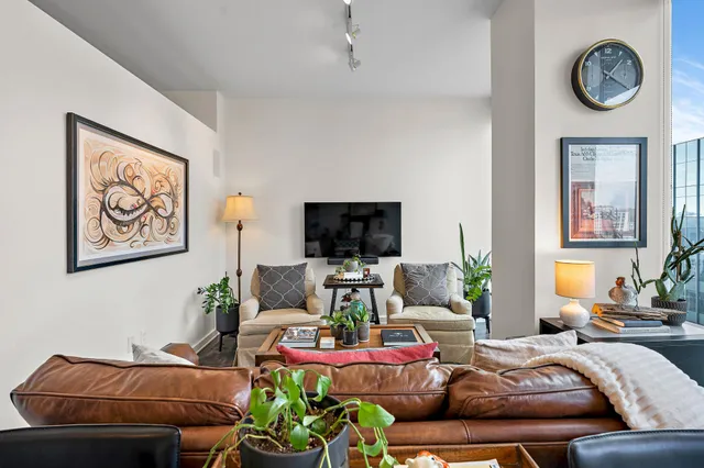 a living room with furniture and a couch