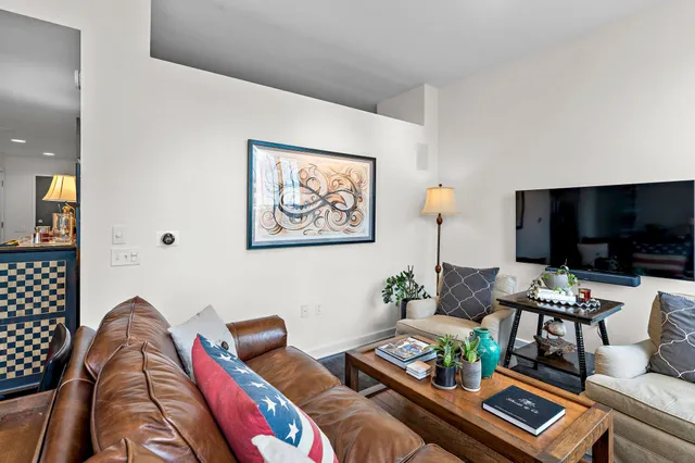 a bedroom with a bed and a mirror