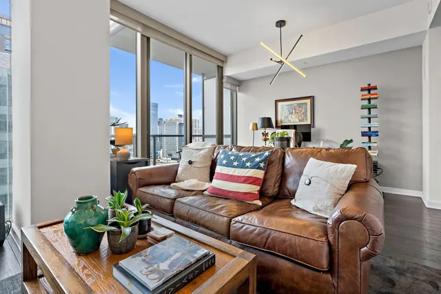 a bedroom with a bed and a television