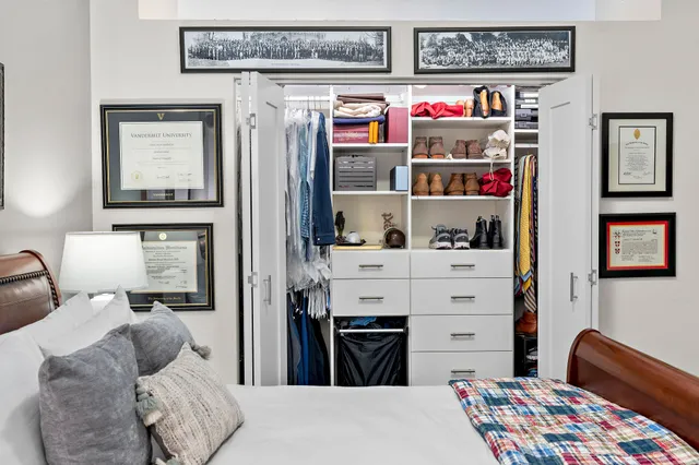 a view of a balcony with a couple of chairs