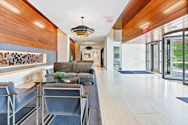 a kitchen with stainless steel appliances a refrigerator and a stove