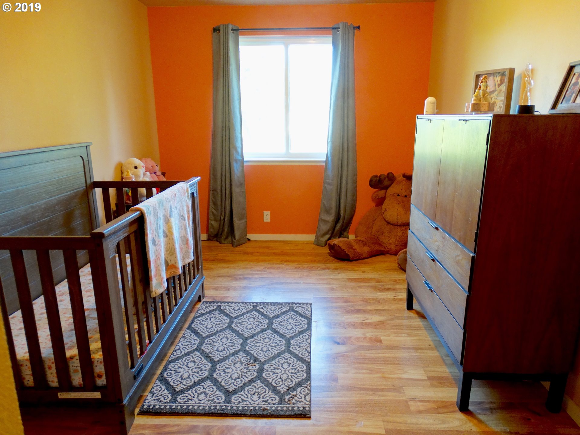 4100 Southwest Dilley Road Forest Grove, OR 97116 - Photo 15 of 27 a view of a hallway with wooden floor and staircase