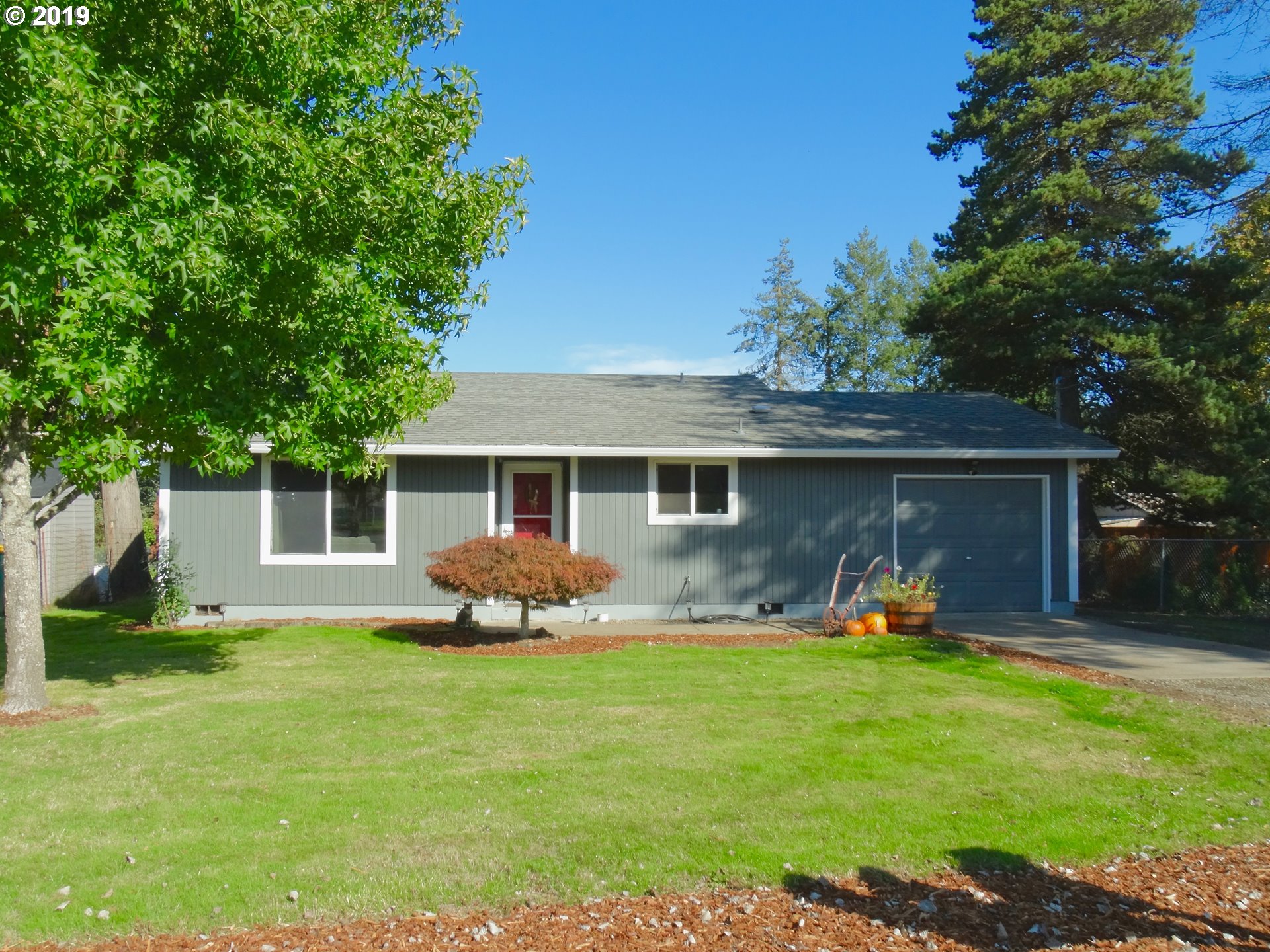 4100 Southwest Dilley Road Forest Grove, OR 97116 - Photo 2 of 27 a front view of house with yard seating and green space