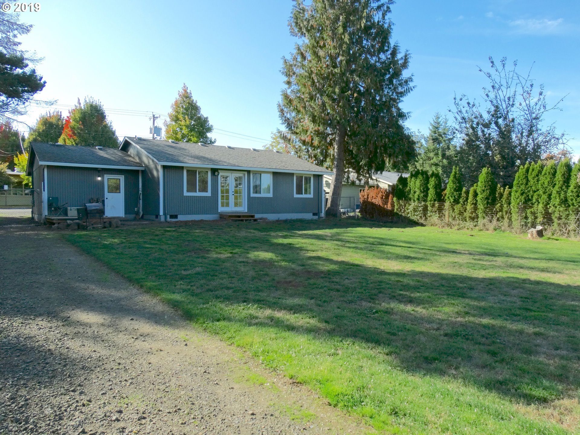 4100 Southwest Dilley Road Forest Grove, OR 97116 - Photo 22 of 27 a view of a house with a yard