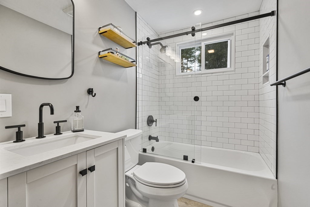 45 Lyndon Road Sharon, MA 02067 - Photo 16 of 31 a bathroom with a sink a toilet and shower