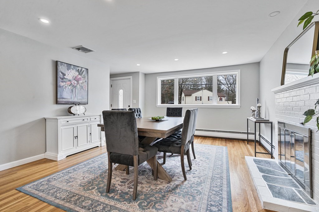 45 Lyndon Road Sharon, MA 02067 - Photo 8 of 31 a view of a dining room with furniture window and wooden floor