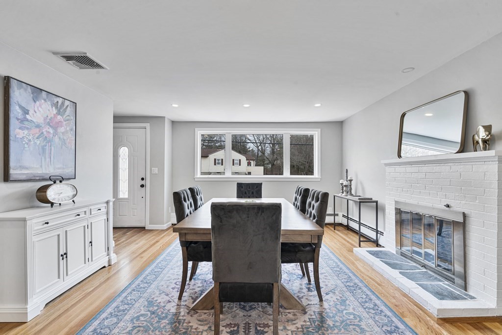 45 Lyndon Road Sharon, MA 02067 - Photo 9 of 31 a view of a dining room with furniture window and wooden floor