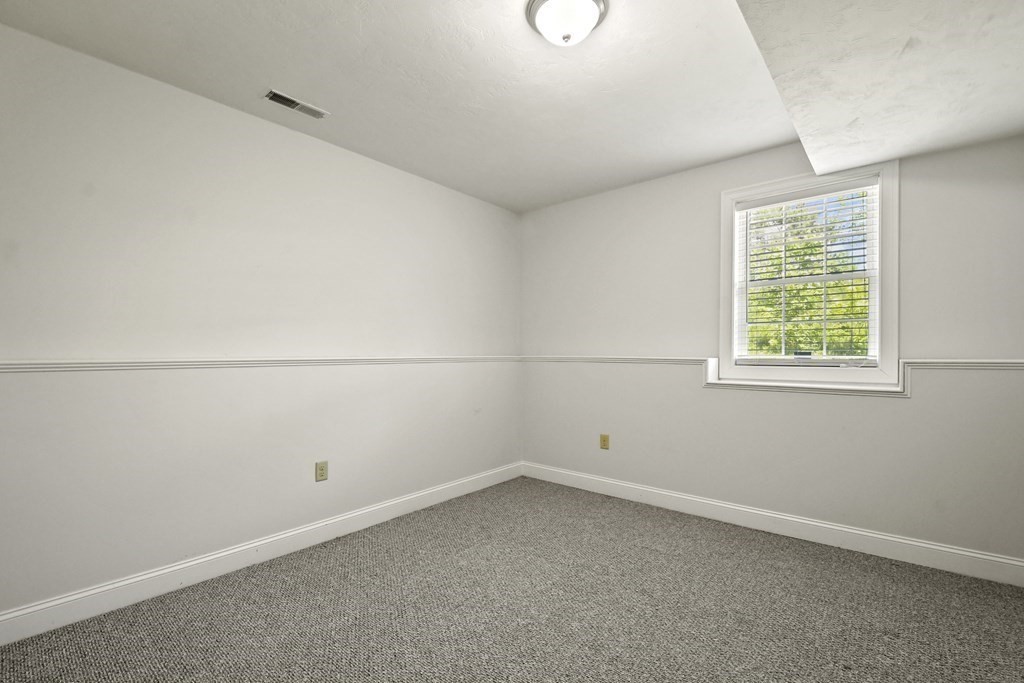 8 Hickory Way Ayer, MA 01432 - Photo 26 of 35 an empty room with a window