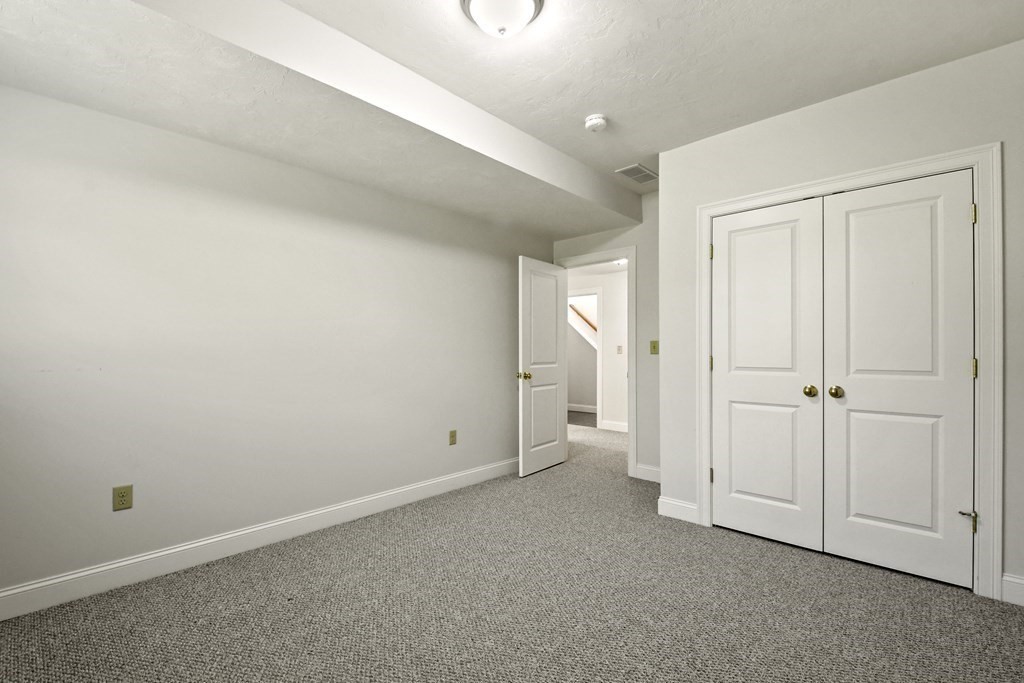 8 Hickory Way Ayer, MA 01432 - Photo 28 of 35 a view of an empty room