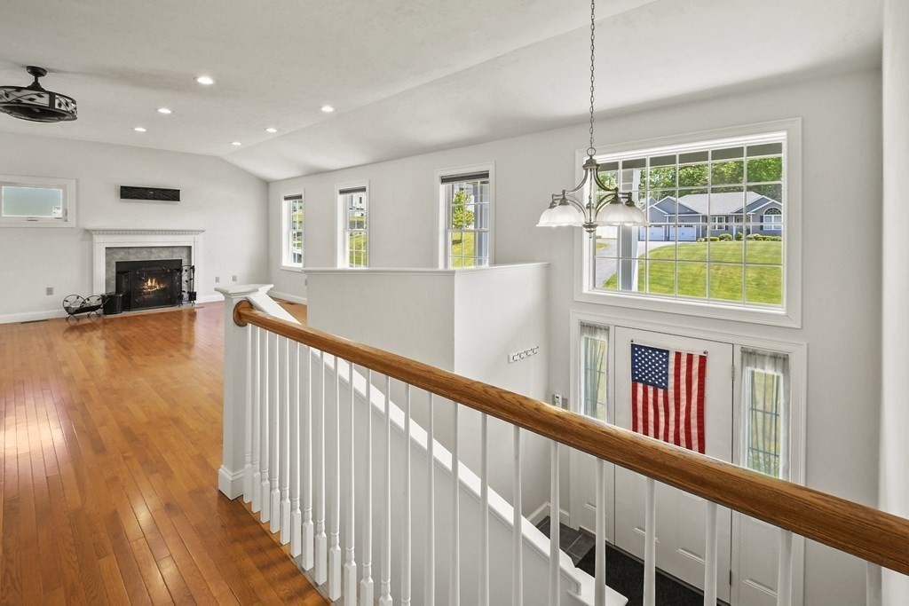 8 Hickory Way Ayer, MA 01432 - Photo 5 of 35 a view of an entryway with wooden floor