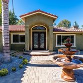 a house view with a outdoor space