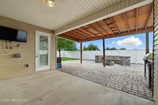 a view of a backyard of a house