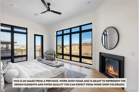 a view of a kitchen with a large window