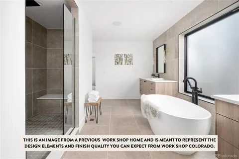 a front view of a house with a yard and deck