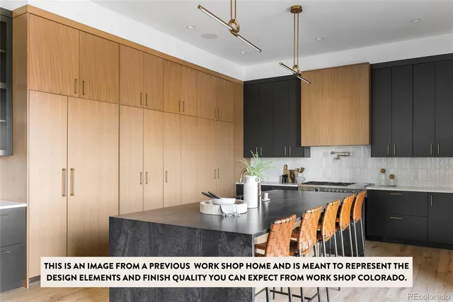 a bedroom with a large bed and a flat tv screen