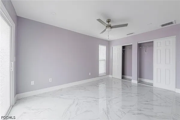 a bathroom with a bathtub and toilet