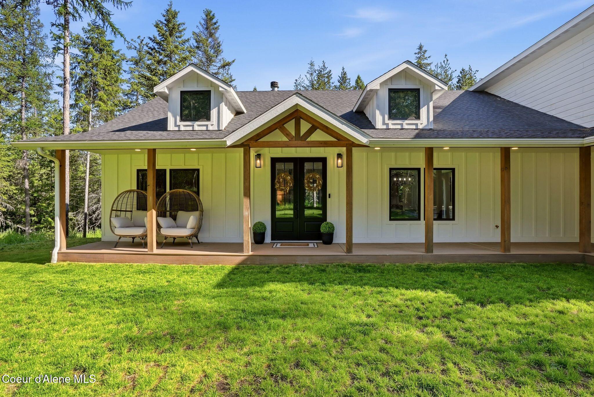 95 Klickitat Road Cocolalla, ID 83813 - Photo 7 of 66 Expansive Front Porch