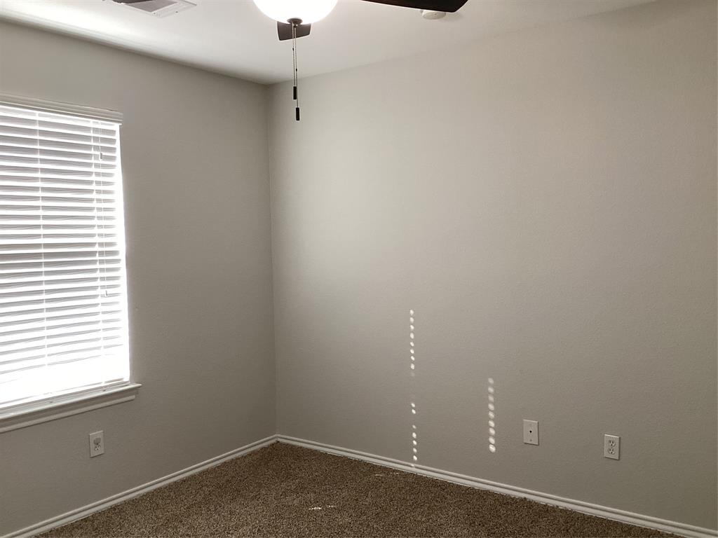 4608 Wolf Ridge Way Fort Worth, TX 76244 - Photo 17 of 23 an empty room with a window