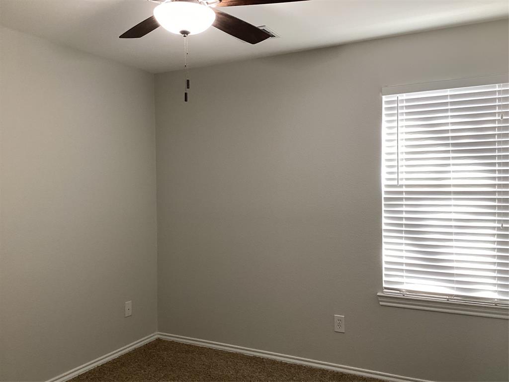4608 Wolf Ridge Way Fort Worth, TX 76244 - Photo 19 of 23 an empty room with a window