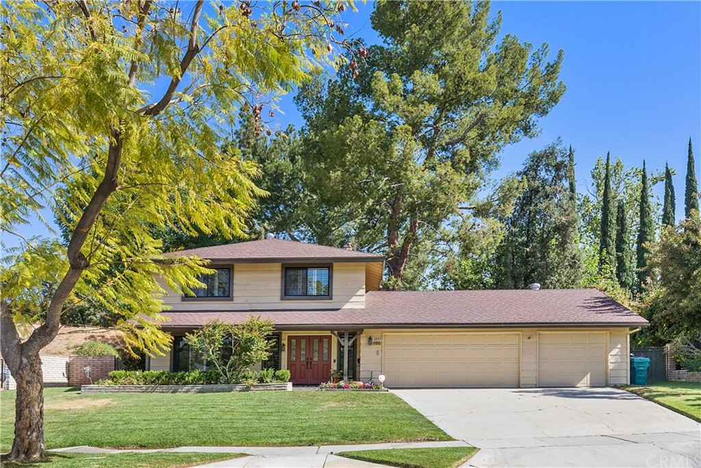 1055 Vía Pintada Riverside, CA 92507 - Photo 1 of 1 a front view of a house with a garden