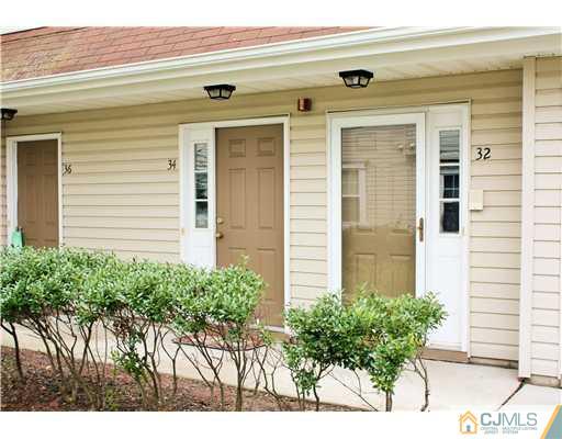 34 Inverness Drive Edison, NJ 08820 - Photo 2 of 16 a front view of a house with a yard