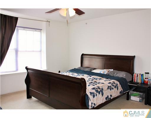 34 Inverness Drive Edison, NJ 08820 - Photo 9 of 16 a bedroom with a bed and window