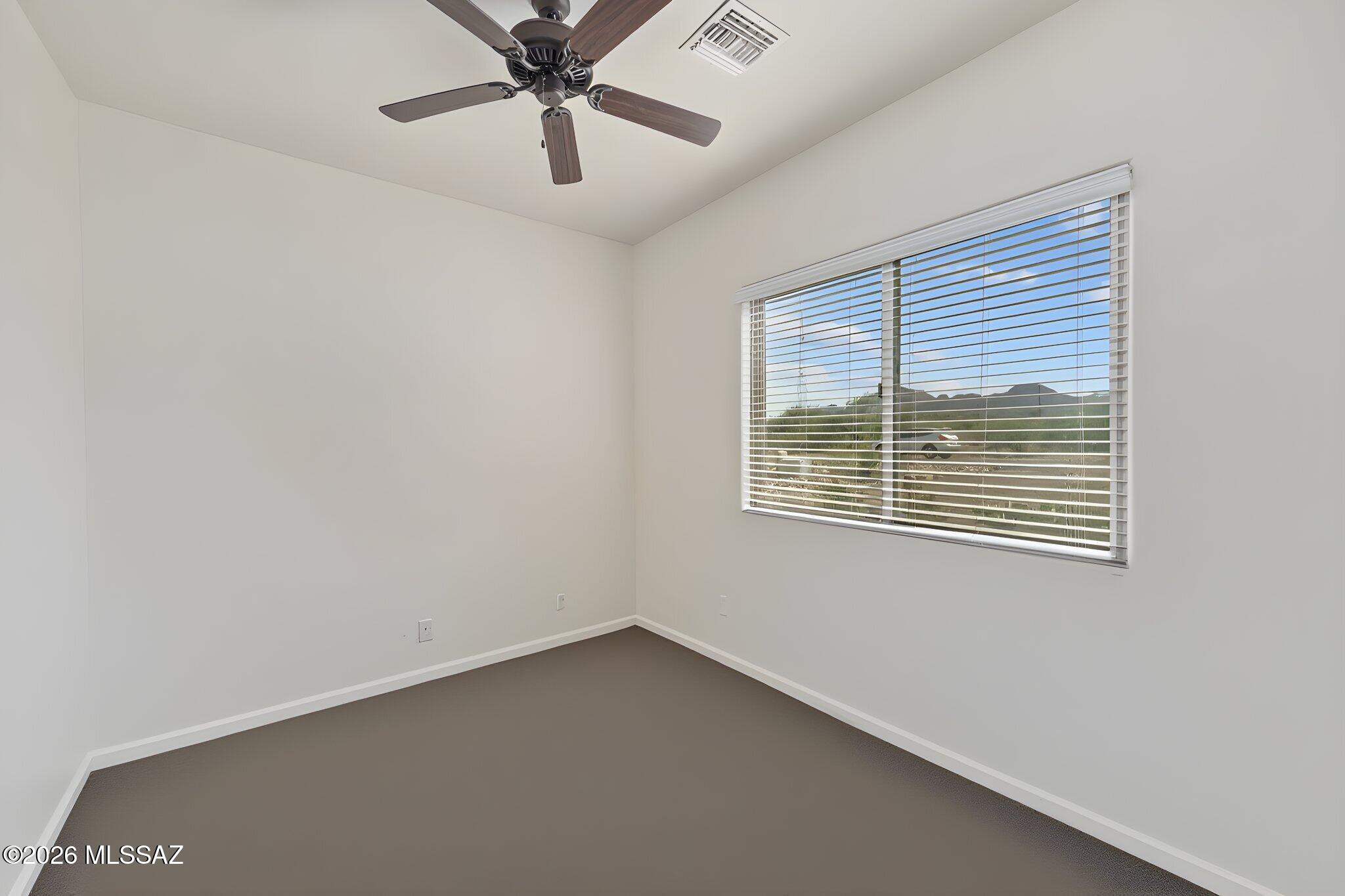 45 High View Court Tubac, AZ 85646 - Photo 36 of 44 an empty room with a window