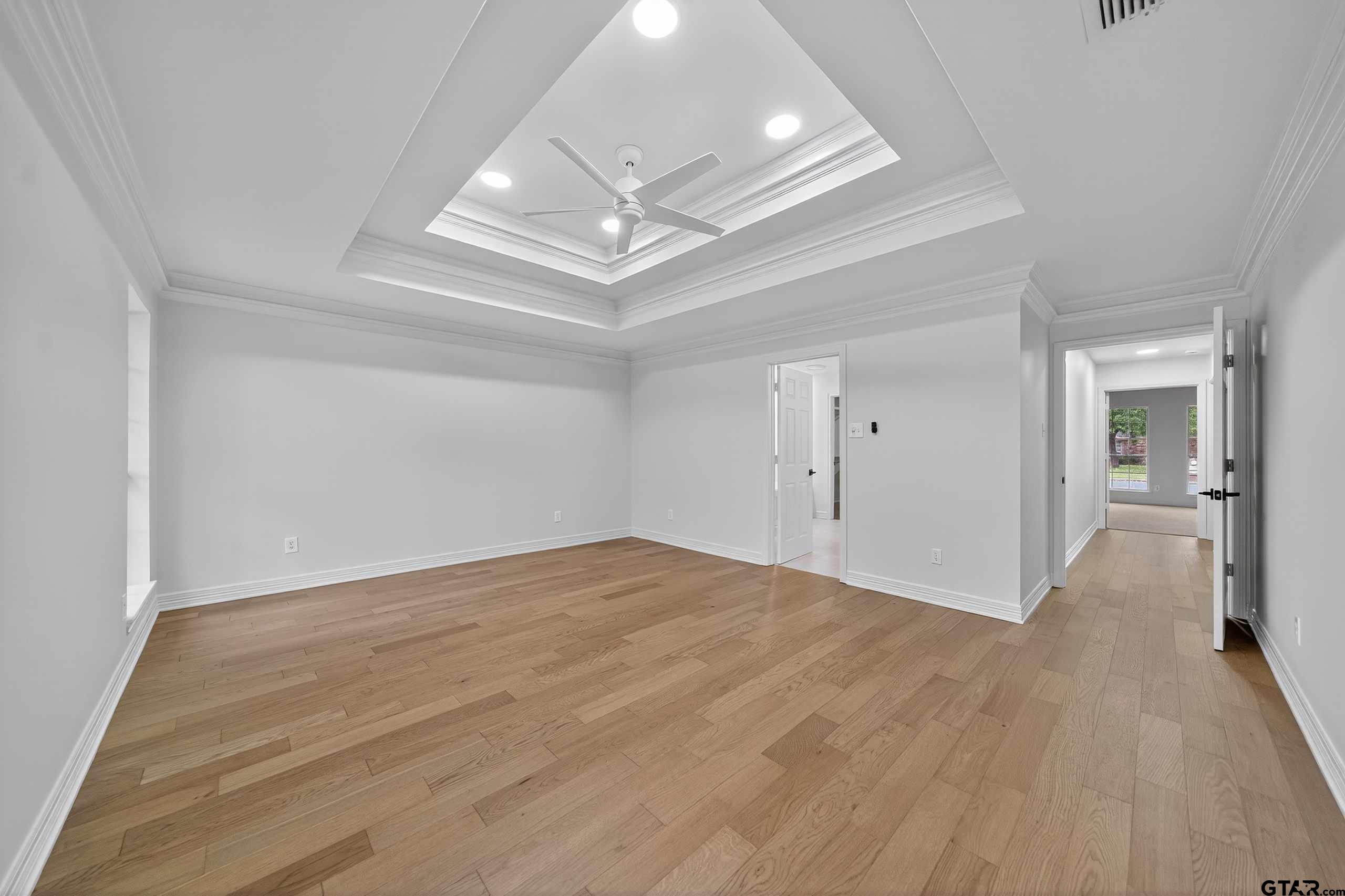 3409 Pebblebrook Drive Tyler, TX 75707 - Photo 19 of 48 wooden floor in an empty room