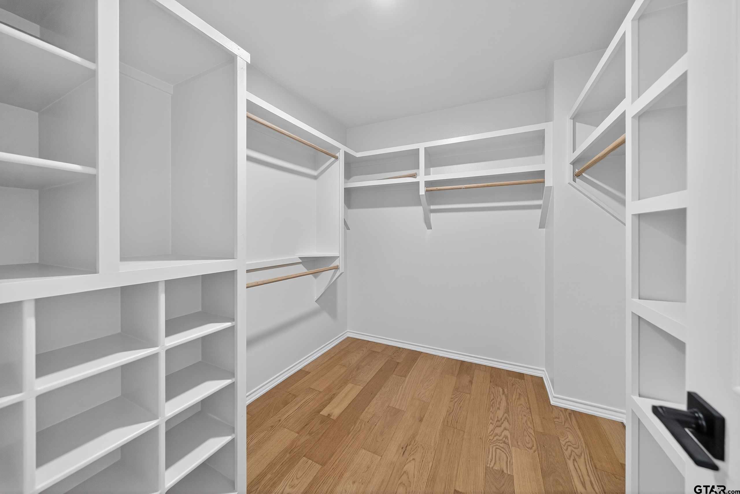 3409 Pebblebrook Drive Tyler, TX 75707 - Photo 24 of 48 a view of an empty walk in closet