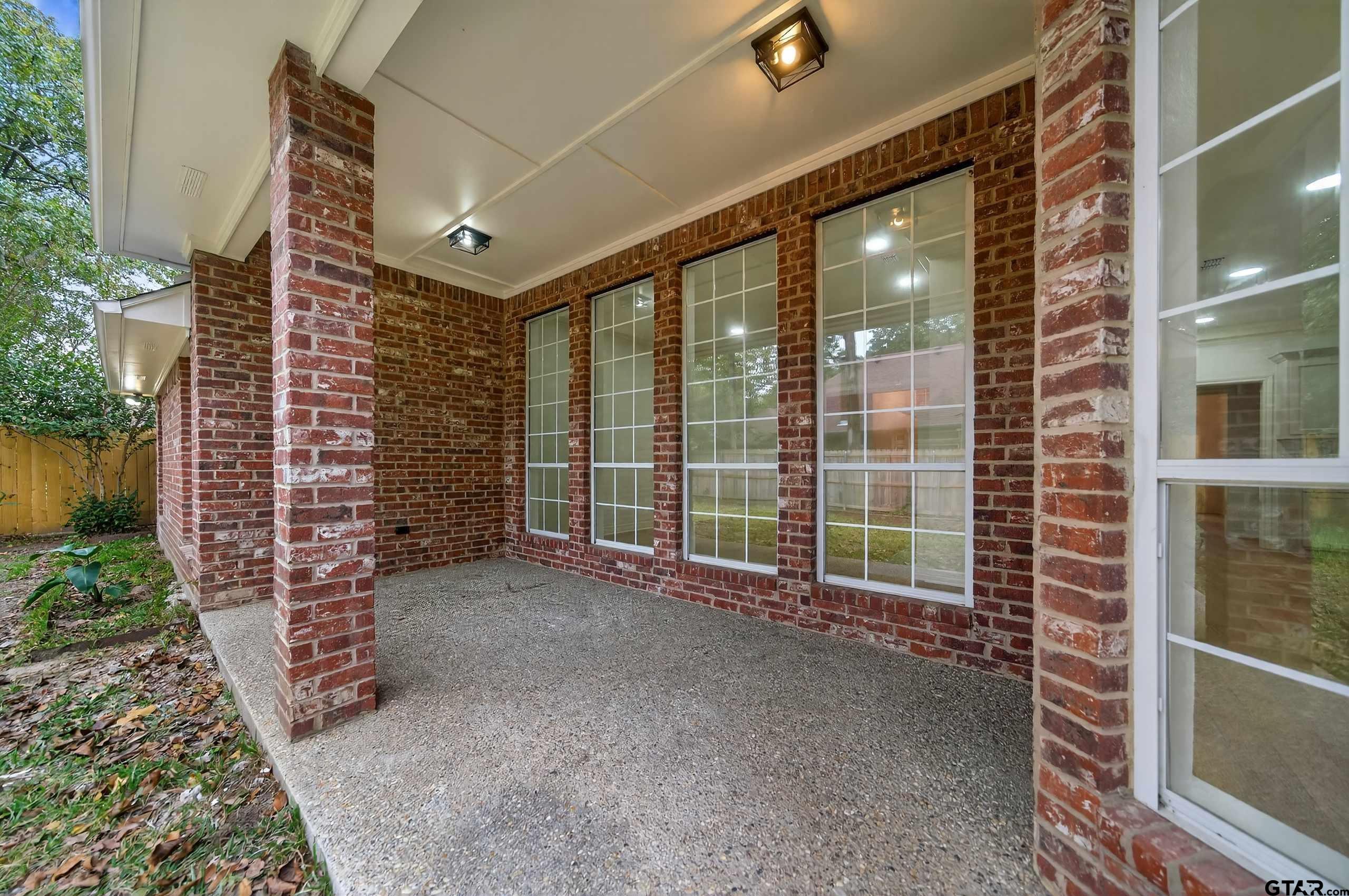 3409 Pebblebrook Drive Tyler, TX 75707 - Photo 47 of 48 a view of an outdoor space with a street