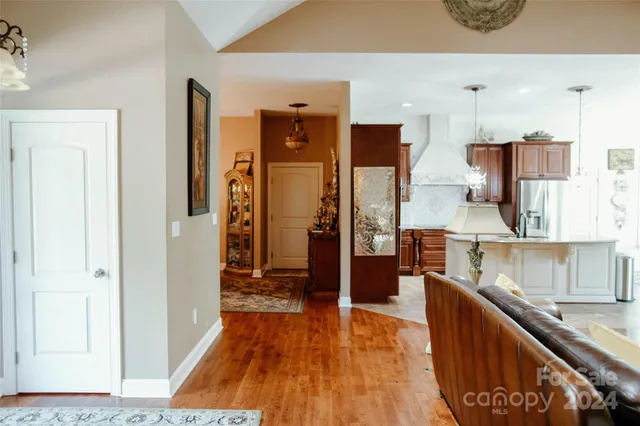 a bathroom with a toilet and a mirror