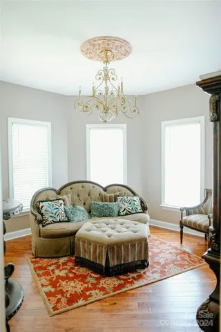 a room with a bed and furniture