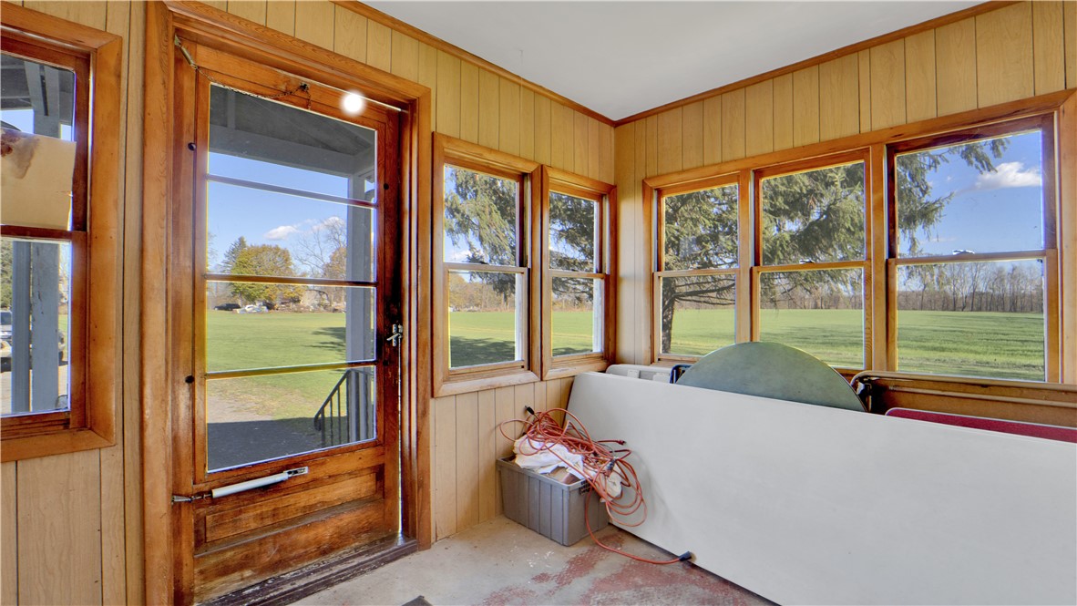 1096 Victor Road Macedon, NY 14502 - Photo 26 of 49 Side Entrance Enclosed Porch off of Kitchen