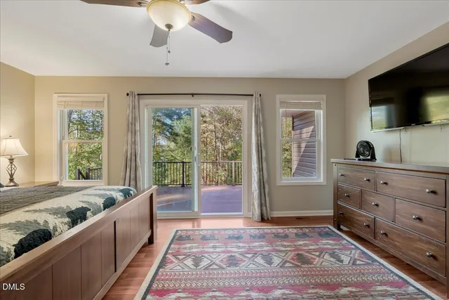 a view of a chair and table on the deck
