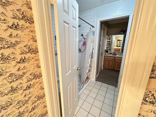 a bathroom with a sink and a shower