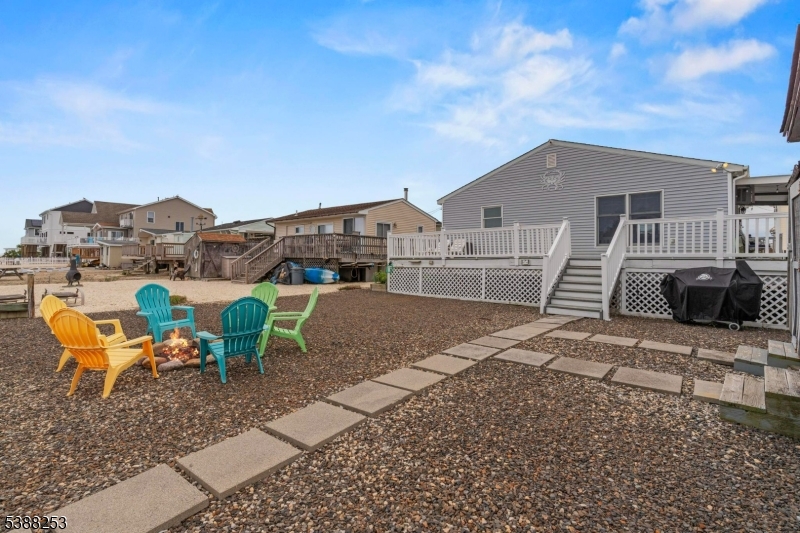 112 Curlew Road Tuckerton, NJ 08087 - Photo 11 of 20 a view of a house with a yard and sitting area