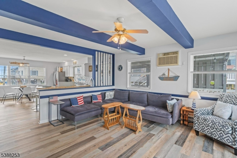 112 Curlew Road Tuckerton, NJ 08087 - Photo 3 of 20 a living room with furniture and wooden floor