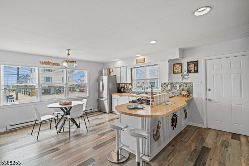 112 Curlew Road Tuckerton, NJ 08087 - Photo 7 of 20 a living room with furniture and a wooden floor