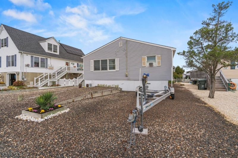 112 Curlew Road Tuckerton, NJ 08087 - Photo 8 of 20 a view of a house with a yard