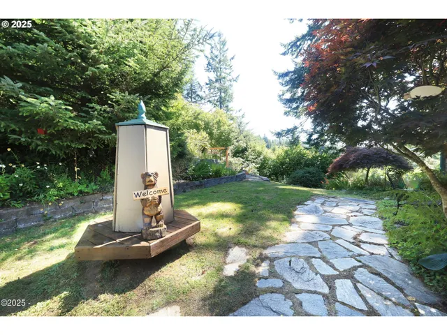 a view of a park with large trees