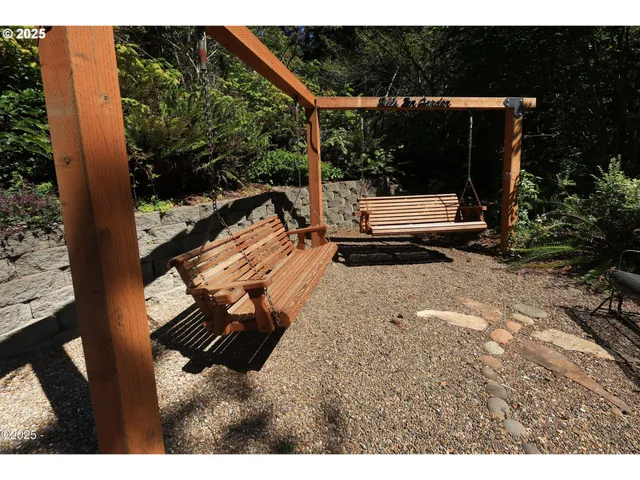 a view of a couch and chairs in the balcony