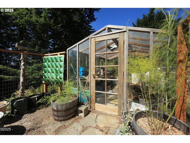 an aerial view of a house with outdoor space