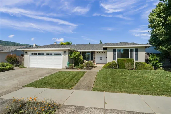 front view of a house with a yard