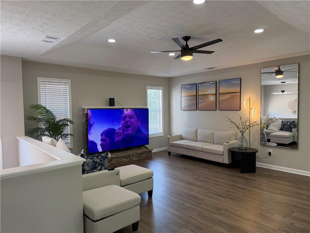 934 Bay Ridge Drive Lawrenceville, GA 30045 - Photo 49 of 78 a living room with furniture and a couch