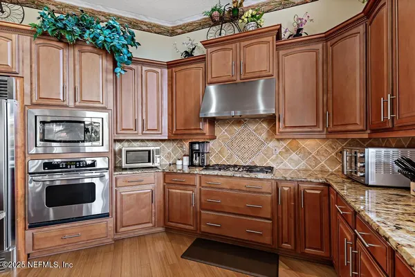a bedroom with a bed and a television in it