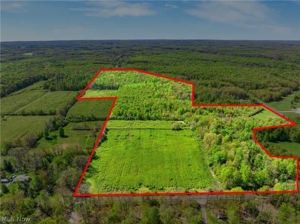 Expansive parcel featuring a blend of wooded and cleared land