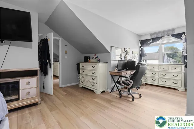 a view of a workspace with furniture