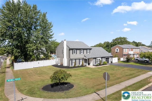a house view with a swimming pool