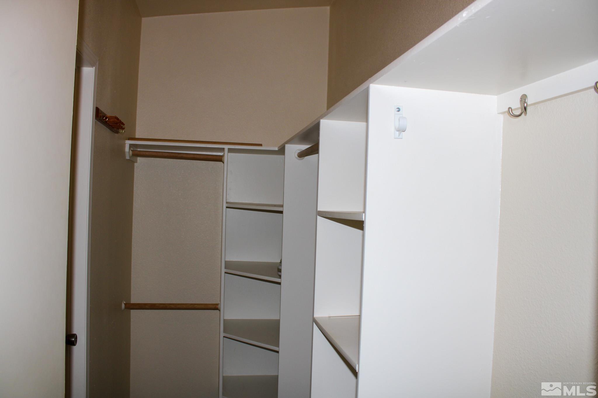 1850 Pam's Place Fallon, NV 89406 - Photo 22 of 40 a view of walk in closet with empty racks