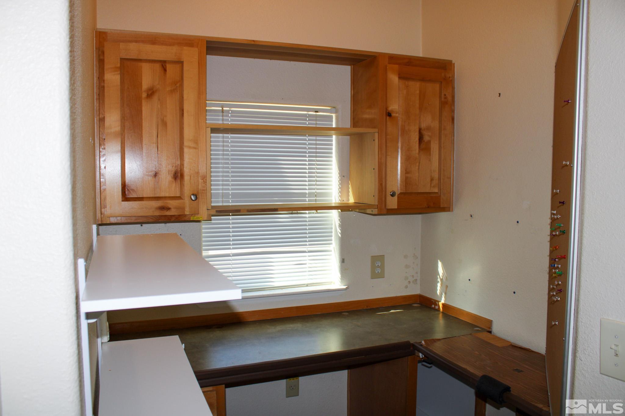 1850 Pam's Place Fallon, NV 89406 - Photo 26 of 40 a bathroom with a sink and a window
